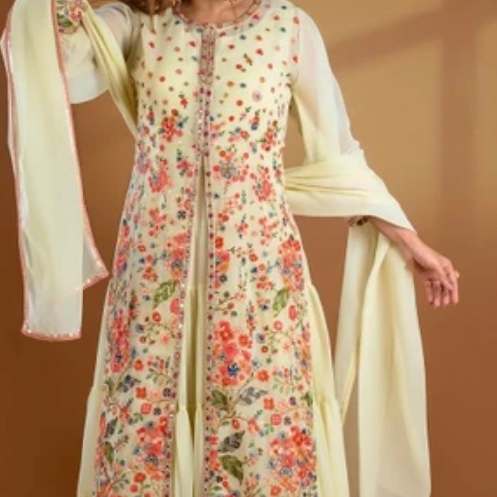 Wonderful light yellow georgette lehenga suit